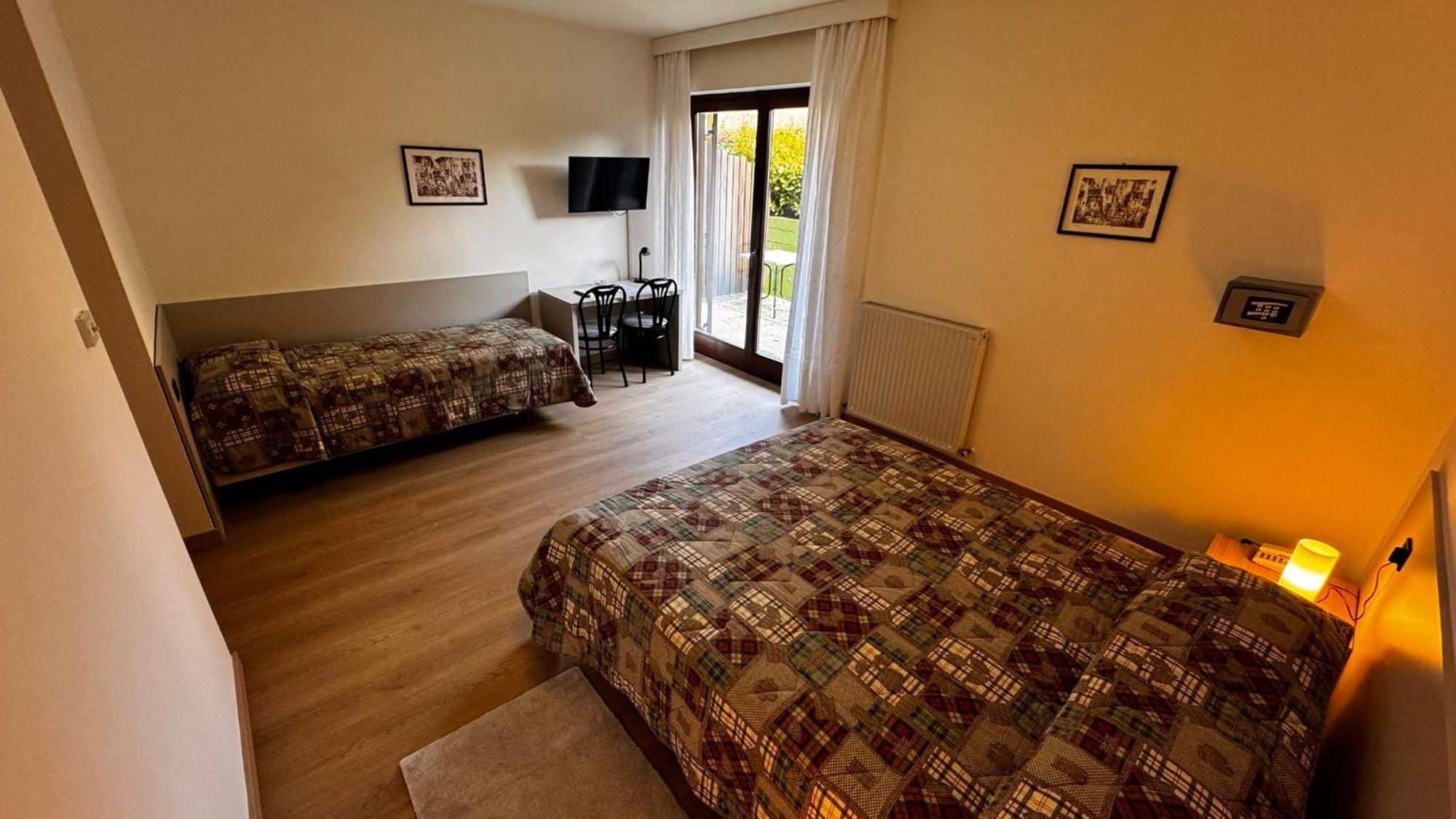 Albergo Stella Alpina Tenno Rum bild